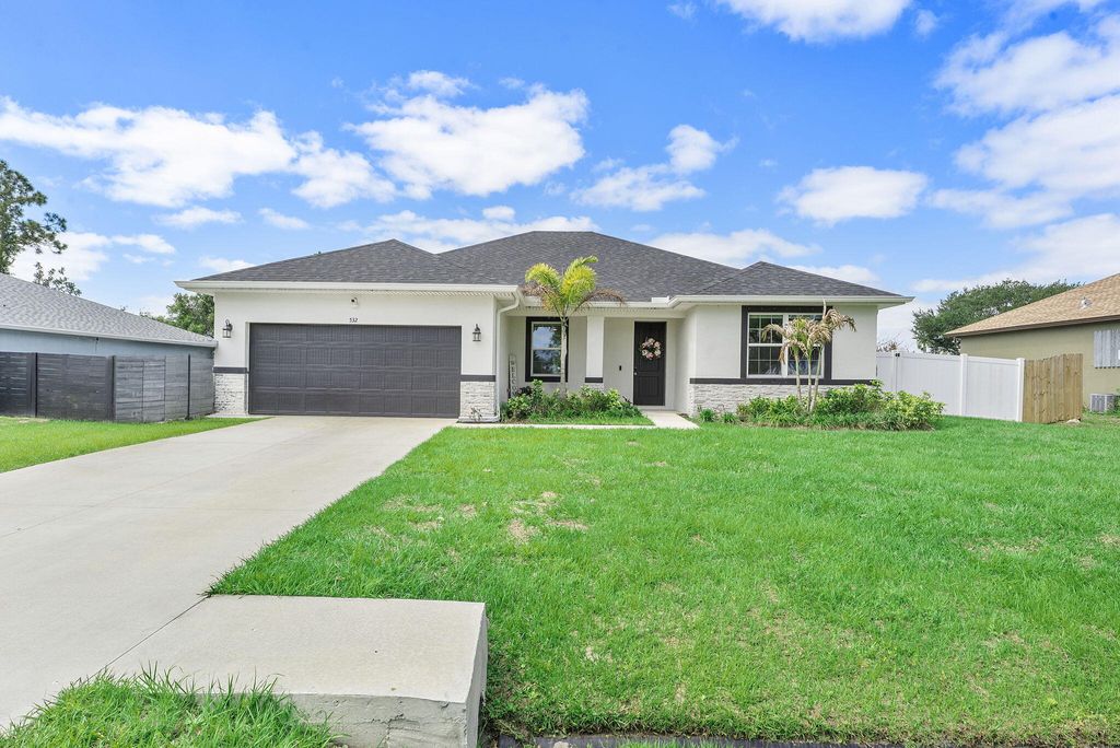 Photo of 532 SW Sansom Lane, Port Saint Lucie, FL 34953 (MLS # B26017488)