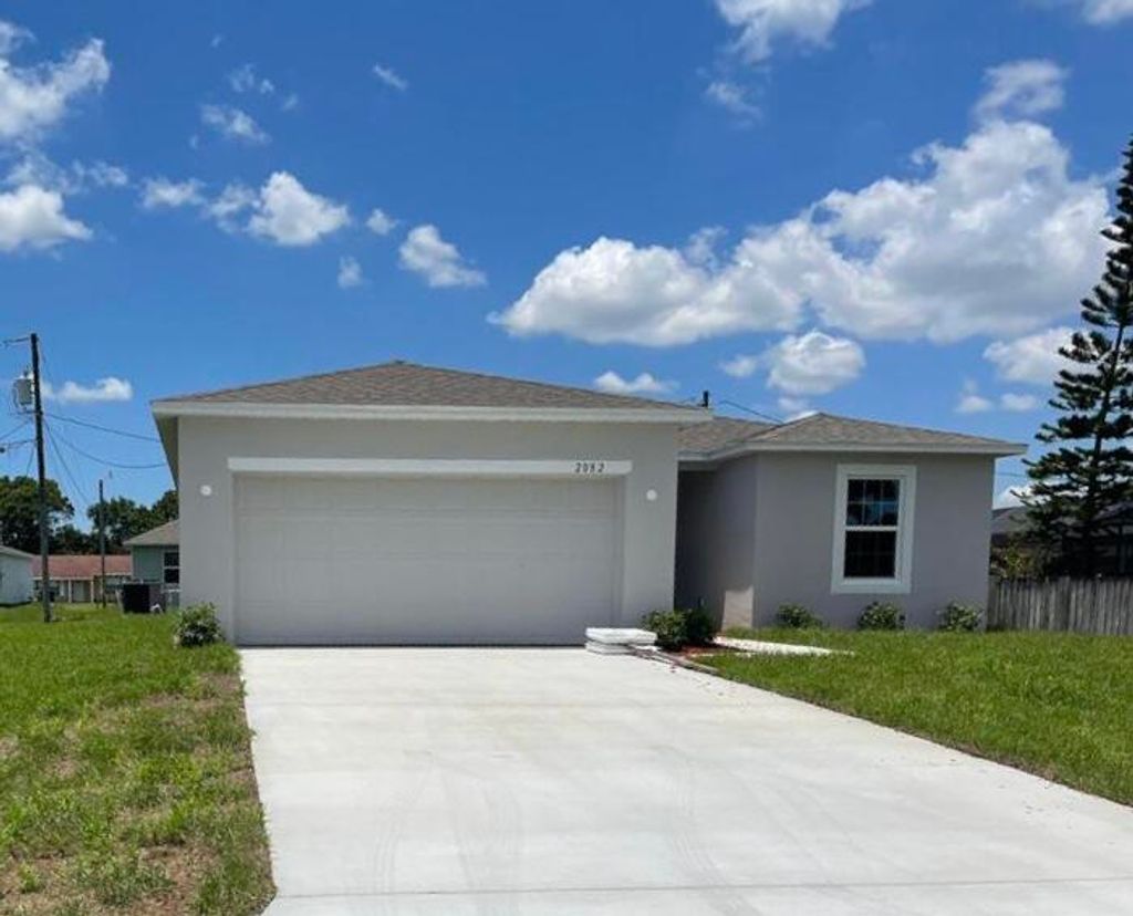 Photo of 2082 SW Burlington Street, Port Saint Lucie, FL 34984 (MLS # R10803738)