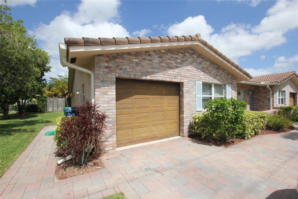 Photo of 4261 NW 110th Avenue #North, Coral Springs, FL 33065 (MLS # F10511304)