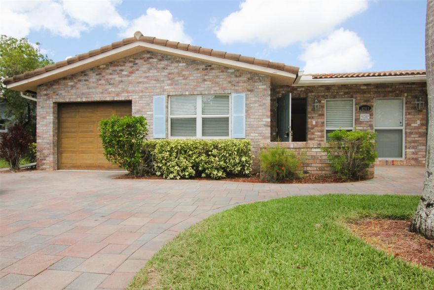 Beautiful 3bd/2ba & 1 car garage, half side of duplex in Coral Springs. Property features include: Impact hurricane windows & doors throughout, neutral tile floors, all wood kitchen with granite counter tops, remodeled bathrooms, paver driveway. Laundry room with Washer and Dryer in unit. Trash is included in rent. Fast approval, no association. Pets ok under 25lb, with non refundable $250 pet deposit. First, last & security required to move in. Min 600 credit score. Income must be over $7000/month.