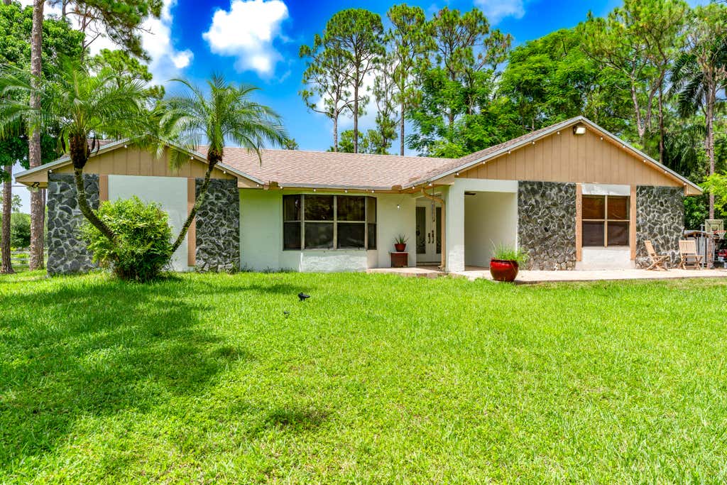 Photo of 15211 60th Place N, The Acreage, FL 33470 (MLS # B26067604)