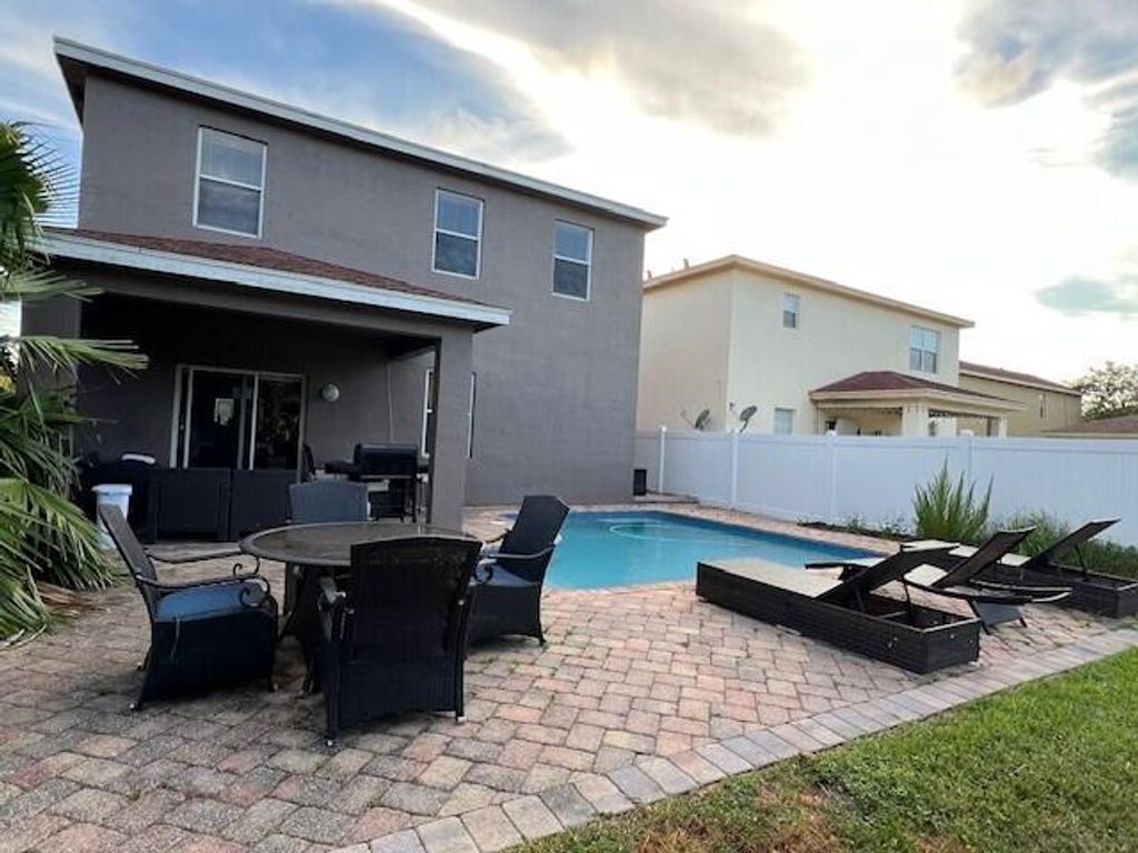 Photo of 144 Blue Grotto Drive, Fort Pierce, FL 34945 (MLS # B26014227)