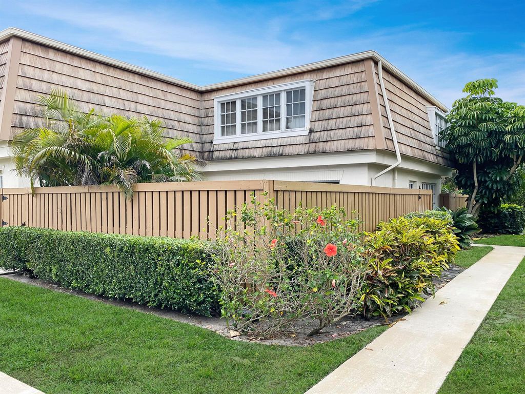 Photo of 11697 Ficus Street #D, Palm Beach Gardens, FL 33410 (MLS # R10776992)