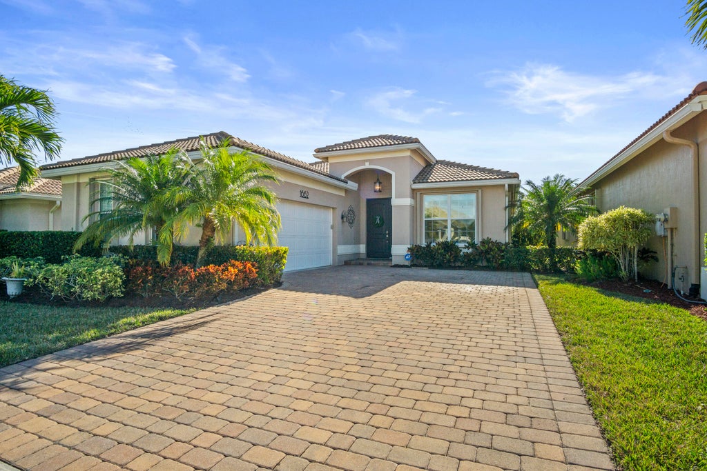 Photo of 1662 NW Old Oak Terrace, Jensen Beach, FL 34957 (MLS # R11057999)