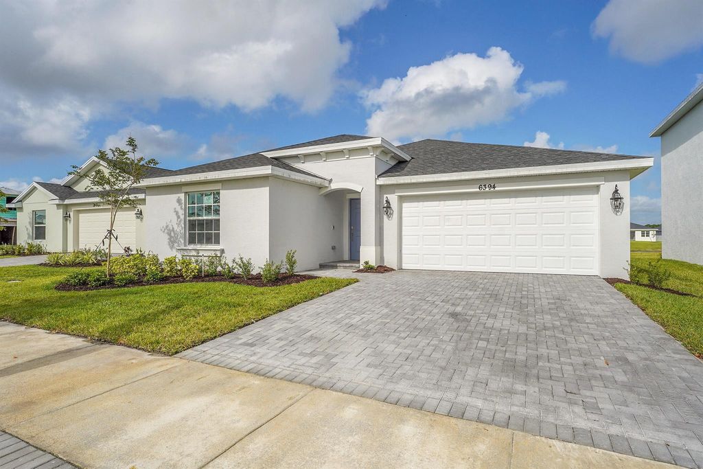Photo of 6394 NW Windwood Way, Port Saint Lucie, FL 34987 (MLS # R11077970)