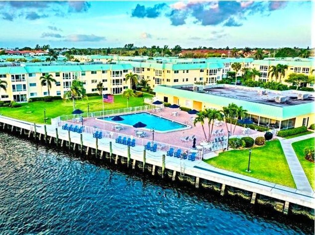 Photo of 21 Colonial Club Drive Dr #304, Boynton Beach, FL 33435 (MLS # R10813023)