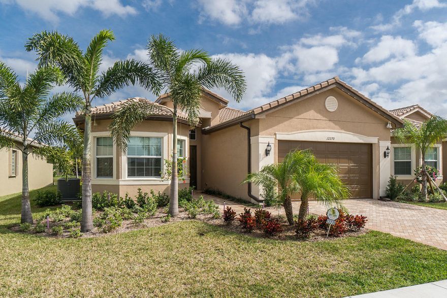 HUGE PRICE REDUCTION! PRICED TO SELL! MOTIVATED SELLERS BECOMES A BUYERS DREAM! DON'T MISS THIS INCREDIBLE OPPORTUNITY! 180K IN BUILDER/DESIGNERS UPGRADES ON A PREMIUM WATER VIEW FOR PEACEFUL LIVING! This Bimini is a 3BR PLUS den at 2318 sq ft under air is a MUST SEE! Gorgeous designer kitchen w double stacked lighted cabinets w stunning backsplash, quartz countertops, upgraded appliances, fabulous lanai w expanded 
screened-in porch, impact windows, 24x24 porcelain tile, upgraded carpet in beds & den, 42' wall cabinets in laundry room & more.. Master bathroom is exquisite w designer light fixtures on framed mirror to ceiling, window coverings in beds & den, Custom closet system in all closets. Washer/dryer, desk in den & wall unit in family room do not convey but are negotiable.