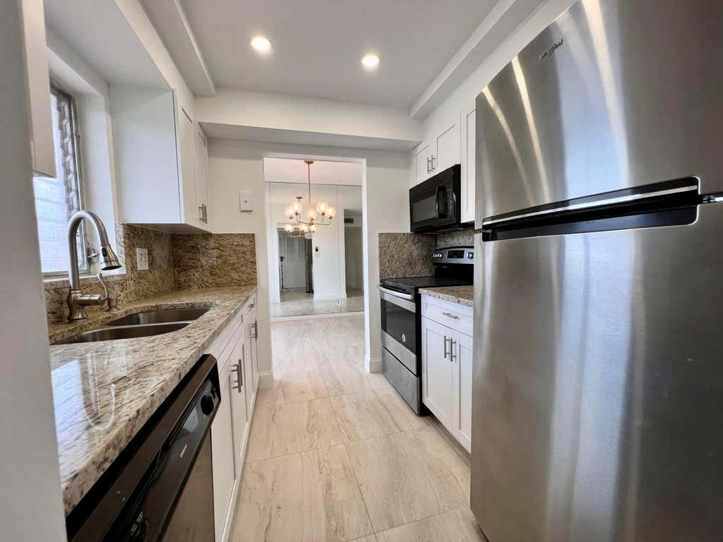 Photo of 3 Golfs Edge #A, West Palm Beach, FL 33417 (MLS # B26062155)