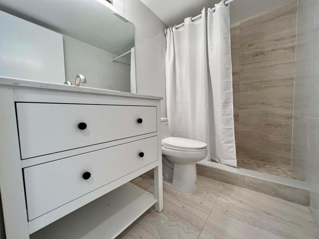 Photo of 3 Golfs Edge #A, West Palm Beach, FL 33417 (MLS # B26062155)