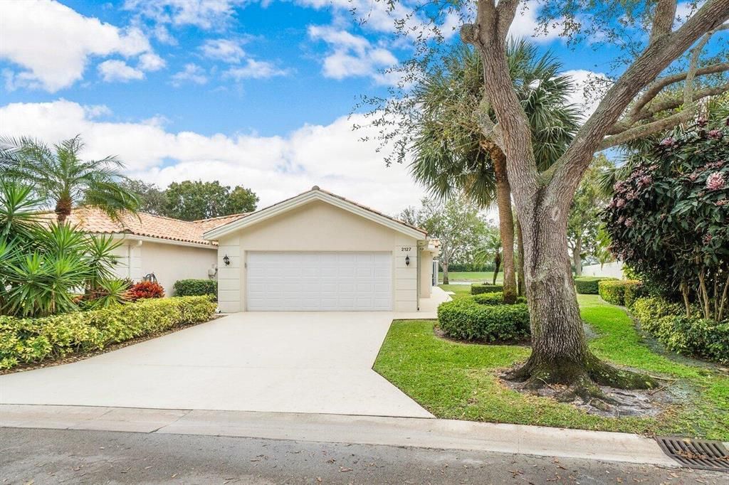 Photo of 2127 Blue Springs Road, West Palm Beach, FL 33411 (MLS # R10771577)