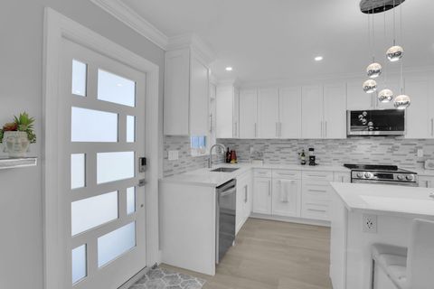 Photo of 540 High Point Drive #A, Delray Beach, FL 33445 (MLS # R11132008)