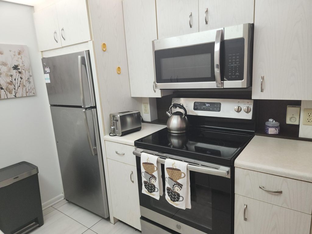 Photo of 3059 Ainslie Drive #D, Boca Raton, FL 33434 (MLS # B26010637)