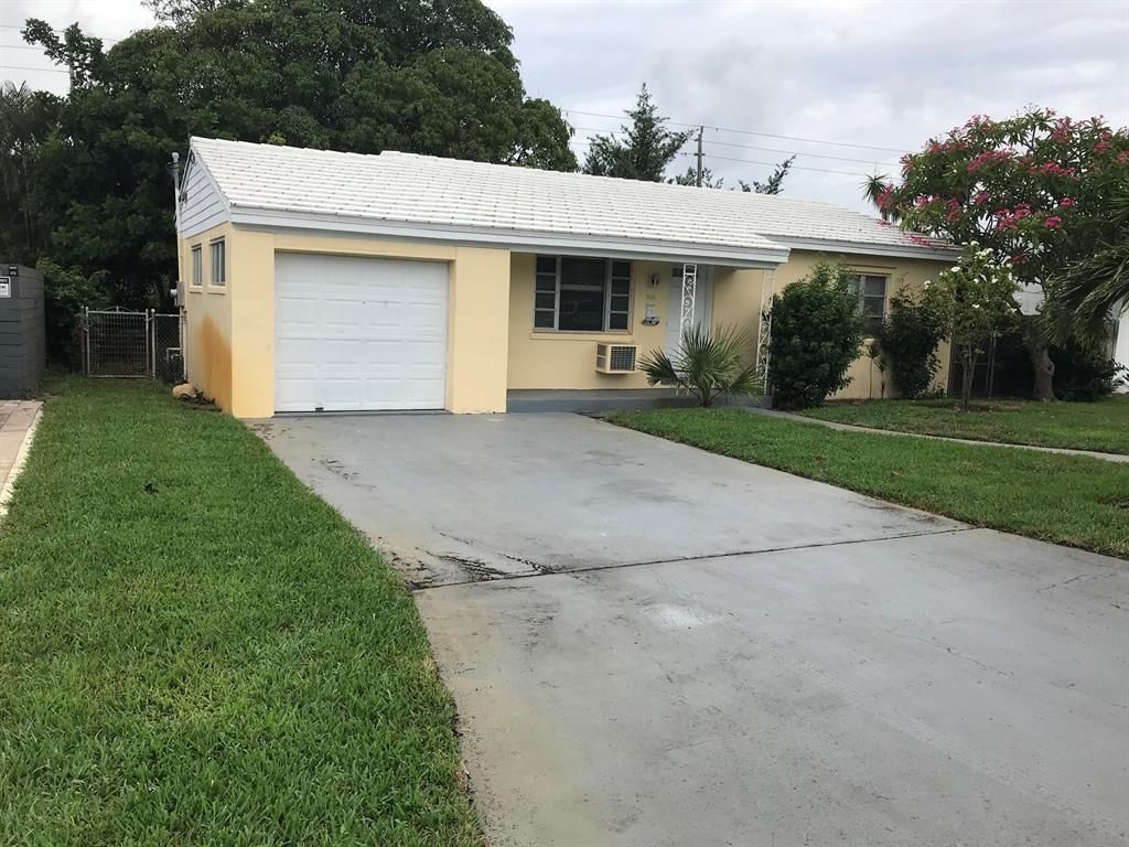 Photo of 7802 Martin Avenue, West Palm Beach, FL 33405 (MLS # R10723803)
