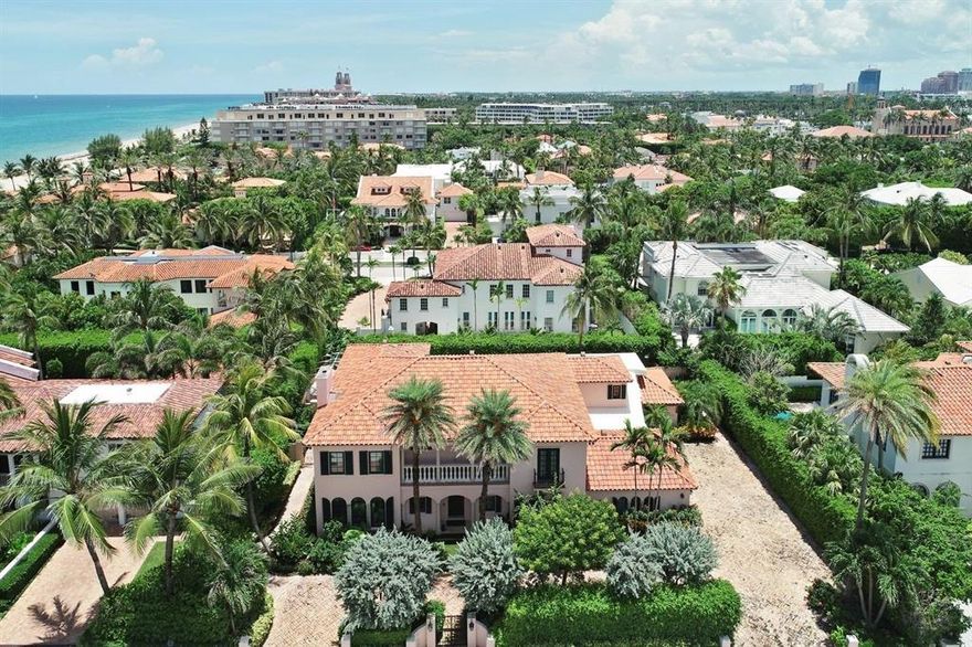 Come home to the old world charm of this Mediterranean home located in the heart of Palm Beach. Located on the classic ocean block of Atlantic Ave. this home features 5 spacious bedrooms, 5.5 baths, beautiful architectural touches, custom chef's kitchen including 2 Miele dishwashers, 3 sub-zero refrigerators and wine coolers. The open floorpan is capped off with a stunning floating masterpiece of a staircase seen as soon as you enter the home. Lavish pool and spa area perfect for in-season entertaining or cooling off in the summer. Steps to the world famous beaches of Palm Beach and two blocks to the lake trail. Short drive to the world renowned shopping on Worth Avenue. Escape the winter in style and make this gorgeous Palm Beach estate yours!