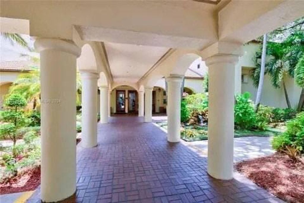 Photo of 1831 Sabal Palm Drive #303, Davie, FL 33324 (MLS # B26008037)