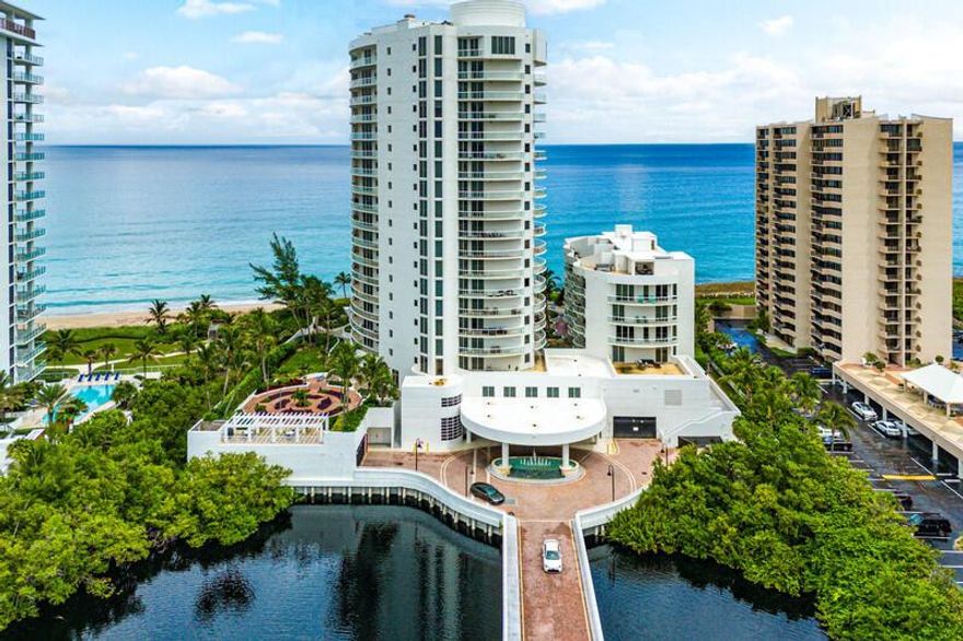 Exclusivity and privacy await you in this rarely offered 3 bedroom, 3 bath meticulously maintained residence with expansive unobstructed ocean and intercoastal views located in Beach Front, a boutique-like building with only 51 residences. The elevator takes you to your own private foyer which leads directly into the sunlit living area with spectacular endless views of the Atlantic Ocean. Features include a newly renovated chef's kitchen featuring  a Sub- Zero refrigerator, Miele induction cooktop, GE Monogram  oven and microwave and so much more. A polished travertine floor throughout reflects the sunlight from expansive UV tinted sliding doors abound in each room. Every slider is also fitted with Bandalux electric blinds for beauty and comfort.  See Supplement...