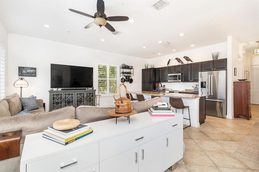 This charming, corner 2-story residence is the perfect city townhome in the heart of Antique Row, one of West Palm's most coveted neighborhoods. Ideal for seasonal or full-time residents. This beautifully updated 2 Bedroom, 2 Bathroom plus a den features an open floor plan, with abundant natural light, a modern kitchen with stylish cabinetry and new Bosch stainless steel appliances. Hardwood flooring, plantation shutters, impact windows and doors throughout. Outdoor patio. Attached garage. Located steps from Antique Row's premier shops, galleries and dining, with easy access to downtown, the waterfront and cultural hotspots. This home combines timeless charm with contemporary comfort and is a must see!