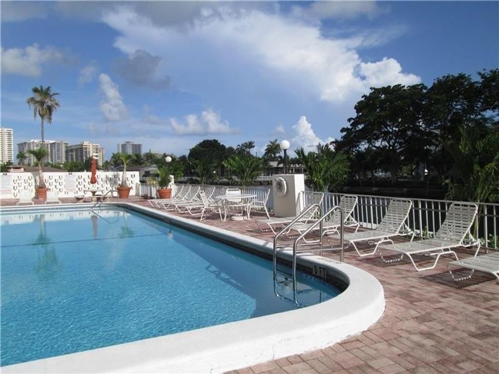 Photo of 401 Golden Isles Drive #314, Hallandale Beach, FL 33009 (MLS # F10420415)