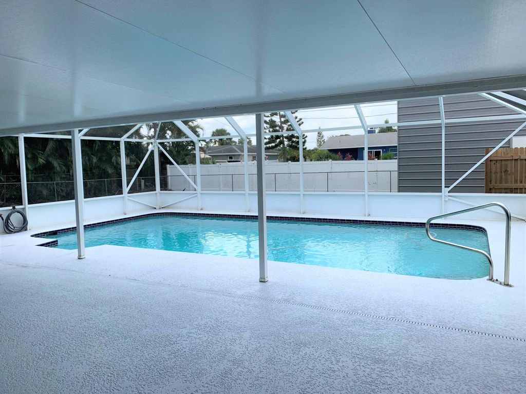 Photo of 826 SW Curtis Street, Port Saint Lucie, FL 34983 (MLS # R10968581)