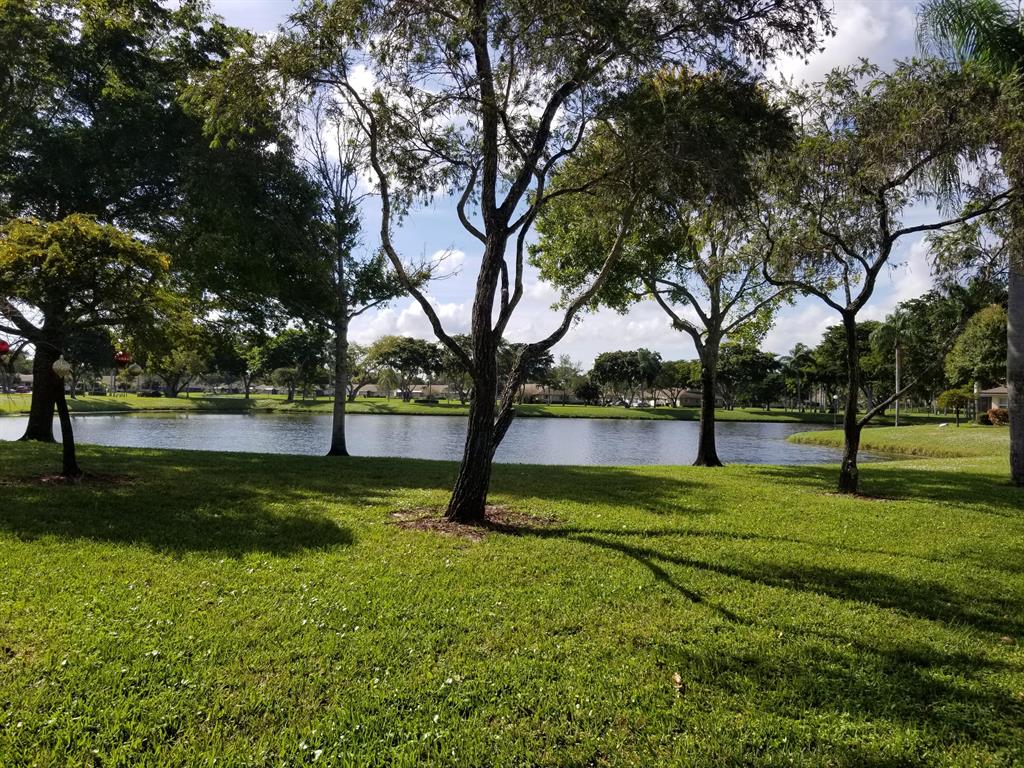 ANNUAL RENTAL IN WHISPER WALK OVER 55 GATED COMMUNITY IN CENTRAL BOCA. Unfurnished gorgeous 2/2 Open bright floor plan living room dining room area., renovated kitchen, walk in closet, unit comes with washer and dryer. Florida room overlooks a beautiful lake with nice sunsets. Close to club house, pool, tennis courts and fitness center. THIS IS A MUST SEE!