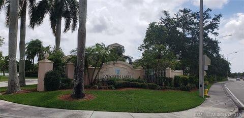 Photo of 5005 WILES Road #108, Coconut Creek, FL 33073 (MLS # B26068342)