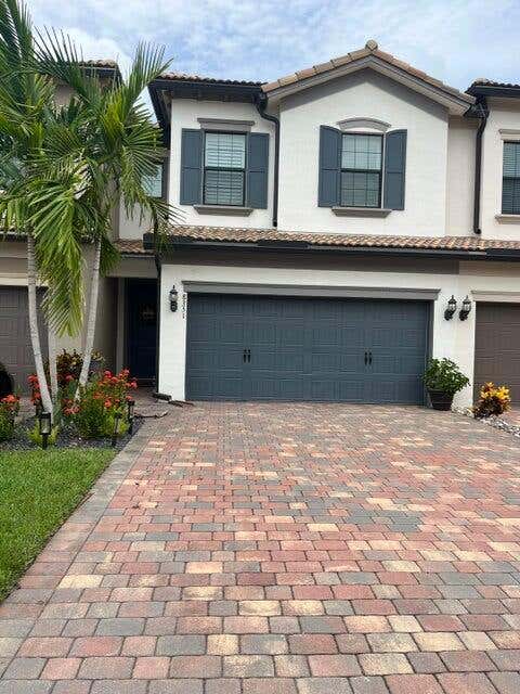 Photo of 8351 Cadre Noir Road, Lake Worth, FL 33467 (MLS # B26019212)