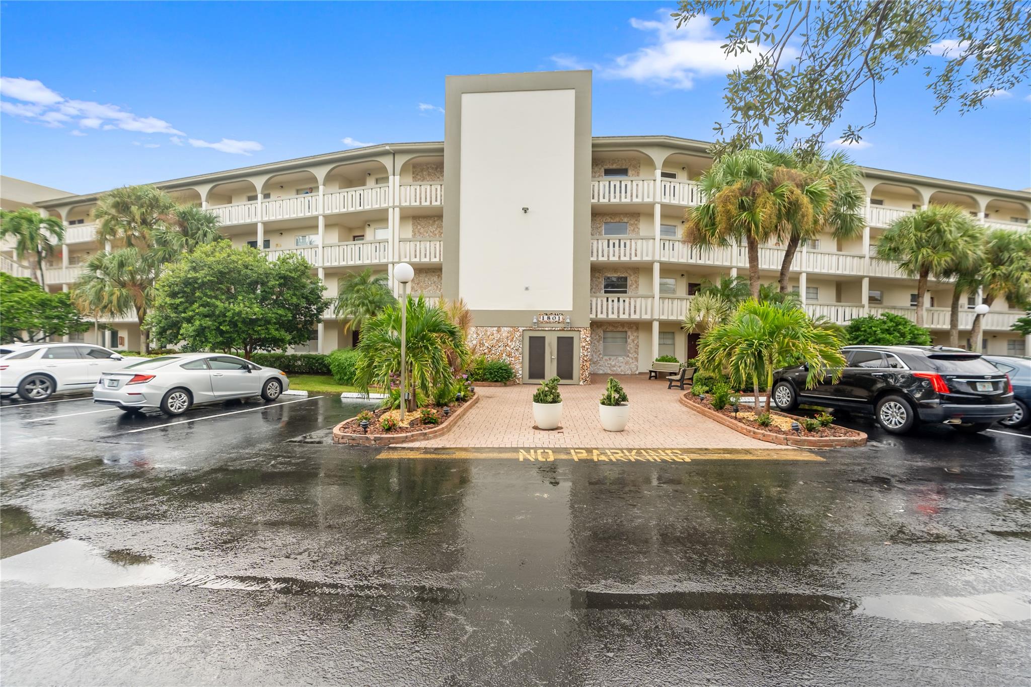 Experience the vibrant, active South Florida lifestyle in this beautifully updated 2-bedroom, 2-bathroom condo. Freshly repainted and meticulously maintained, this bright, spacious unit offers serene pond views from your private, enclosed patio. Enjoy a premier, resort-style living with Wynmoor's amenities: 18-hole golf, massive clubhouse/theater, fitness center, tennis, pickleball, and 19+ pools. A courtesy bus is included. The big, bright layout is perfect for entertaining. Low HOA fee includes many services. Move-in ready! A true opportunity in this desirable, gated 55+ community. Schedule your showing and start living the dream!