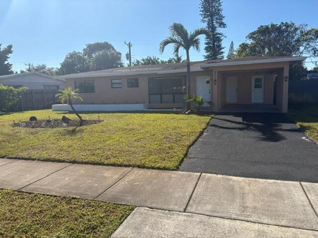 Photo of 830 NE 50th Court, Deerfield Beach, FL 33064 (MLS # R11161464)