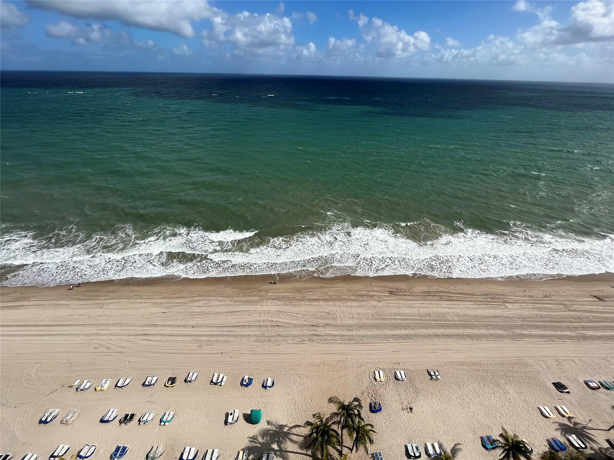 ANNUAL LEASE ONLY. NE corner one-of-a-kind 3 bed/2.5 bath condo located directly on the sand offers great direct ocean views! Completely remodeled w/ high-end Miele® appliances. Stream-lined kitchen hides appliances & refrigerator from view. Smartphone control of condominium. Remote blinds. Master bedroom includes separate glassed-in room/ may be used as private office, sitting room/den. Master bath features deep soaking tub w/rain shower. Huge walk-in closet. Step-in shower in hall bath. Wrap-around balcony. Washer/dryer inside condo. Garage parking. Condominium is currently rented through September 30, 2025. Building offers great amenities incl. heated pool, two exercise rooms, & community room. Southeast Florida resort-style living at its finest! More info w/ photos.