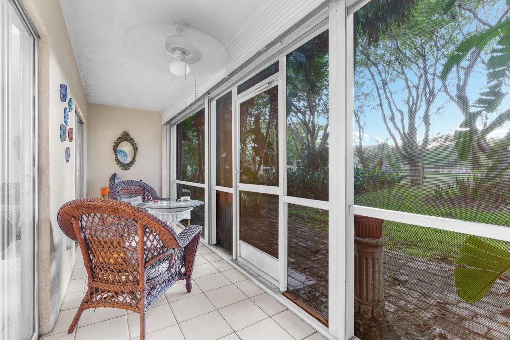 Photo of 2214 S Cypress Bend Drive #105, Pompano Beach, FL 33069 (MLS # F10404014)