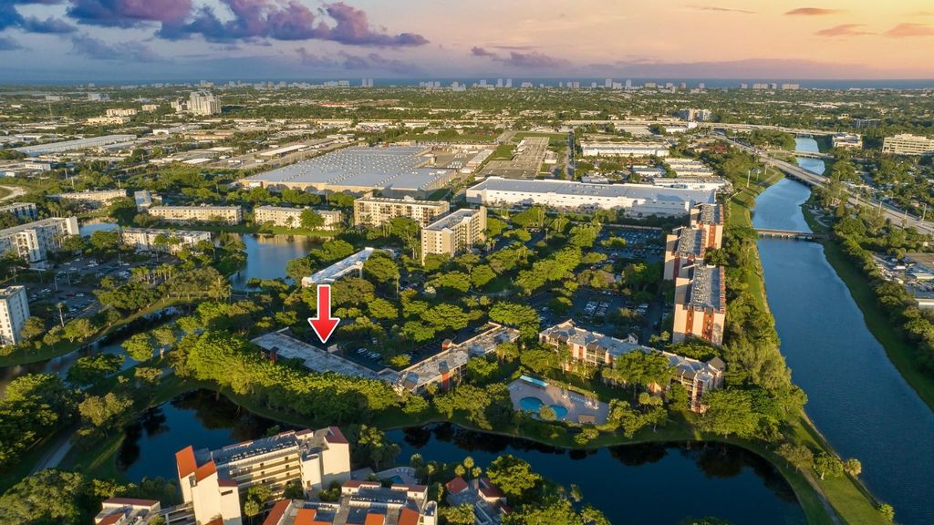 Photo of 2214 S Cypress Bend Drive #105, Pompano Beach, FL 33069 (MLS # F10404014)