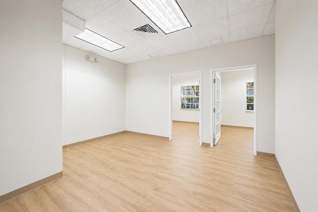 Photo of 100 Village Square Crossing #104, Palm Beach Gardens, FL 33410 (MLS # B26007772)