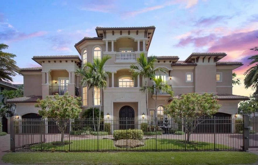 Welcome to 918 Tropic Blvd. Over 8,000 square feet of sprawling living space in this 3 floor waterfront gated home! Drive through your automatic gates with keypad entry. Gourmet chefs kitchen features a sub zero refrigerator and freezer, double dishwasher,built in espresso maker and a food steamer.  With magnificent water views from every window, keep an eye on your yacht with over 200 feet of water frontage.  Whether you are cooking, relaxing by the fireplace, in your office (that can be converted to a bedroom) or entertaining in the great room with a full bar, this home has it all!