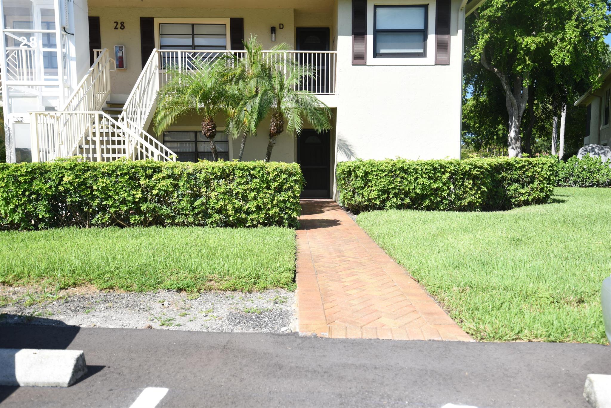 Welcome to Hunters Run . The club has every amenity for perfect resort living. Play our 3 18 hole golf courses, pickleball, tennis, fitness center, 7 dining venues and the friendliest members in south Florida. Something all day to put a smile on your face!!!! Lovely main level corner unit on the golf course with a side patio for golf cart and barbeque dining. Includes 2 bedrooms and 2 baths, dining area , eat in kitchen and screened lanai. Furnished and ready for you.