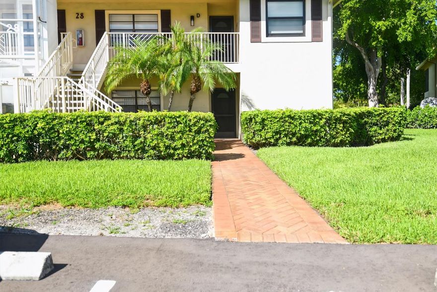 Welcome to Hunters Run . The club has every amenity for perfect resort living. Play our 3 18 hole golf courses, pickleball, tennis, fitness center, 7 dining venues and the friendliest members in south Florida. Something all day to put a smile on your face!!!!      Lovely main level corner unit on the golf course with a side patio for golf cart and barbeque dining. Includes 2 bedrooms and 2 baths, dining area , eat in kitchen and screened lanai. Furnished and ready for you.