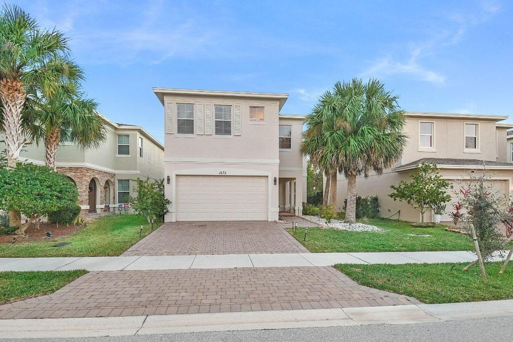 Photo of 1573 NW Cataluna Circle, Port Saint Lucie, FL 34986 (MLS # R11145187)