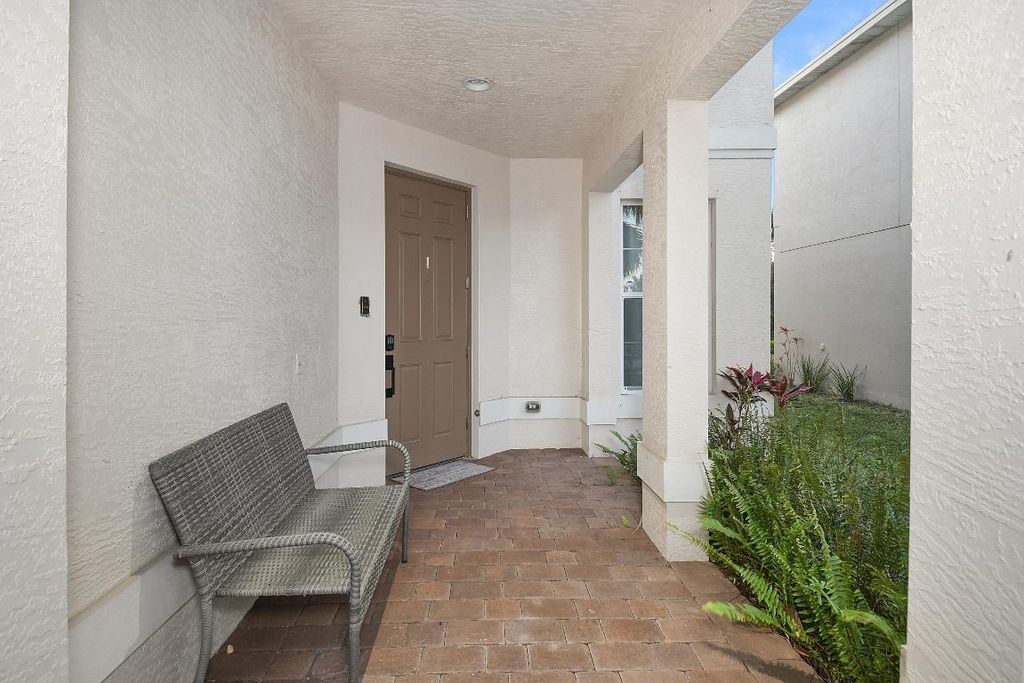 Photo of 1573 NW Cataluna Circle, Port Saint Lucie, FL 34986 (MLS # R11145187)