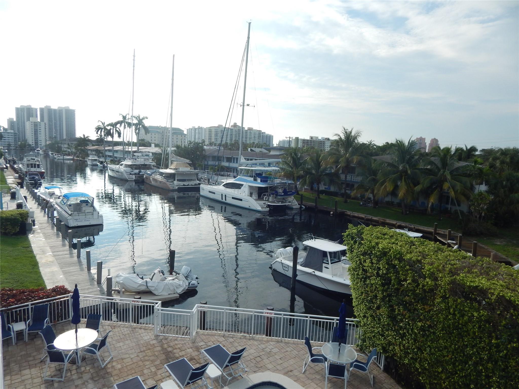 Be the first to live in this totally remodeled top floor condo! Everything is fresh and new! New white kitchen and appliances, new designer bathroom, new A/C new h20 heater, updated electrical and freshly painted! Hurricane impact sliding door and window. Lovely water view all the way down the canal. Relax outside on your large terrace overlooking the waterway and pool. The pool area offers chaise lounges that look down the waterway to the Intracoastal, as well as a bbq grill and tables for entertaining. Very well maintained and secure building with key fobs and cameras for your security. Awesome Coral Ridge Country Club location! Just down the street from lots of great restaurants, and just over the bridge to the beach! Small friendly boutique building.