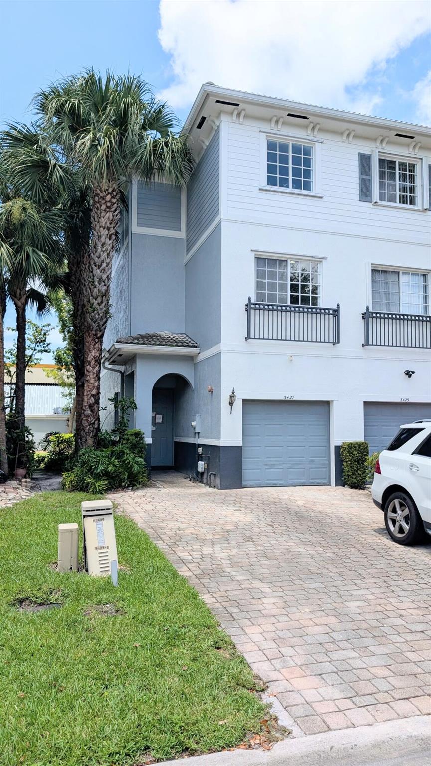Spacious 3-Story Townhome in Gated Community - Prime Central Broward Location! 3-bedroom, 2.5-bathroom townhome with a 1-car garage and additional parking for two more vehicles. This three-story layout offers ample living space and flexible room options for modern lifestyles. Located in a gated community just minutes from Central Broward Park & Broward County Stadium, the Swap Shop, shopping.