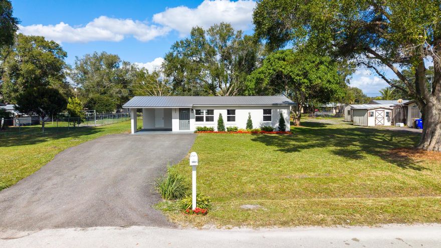 Welcome to this great move-in-ready home on a 14,000+ sq. ft. lot just minutes from Lake Okeechobee. Enjoy an open, airy layout with a newly updated bathroom and a modern kitchen featuring brand-new appliances. Major upgrades include a new roof, impact windows and doors, a new HVAC system, and a tankless water heater for added peace of mind. Outside, the home offers a new driveway with ample parking, a carport with a spacious utility room, and a large backyard with a storage shed. Don't miss this beautifully upgraded home in the heart of Okeechobee!