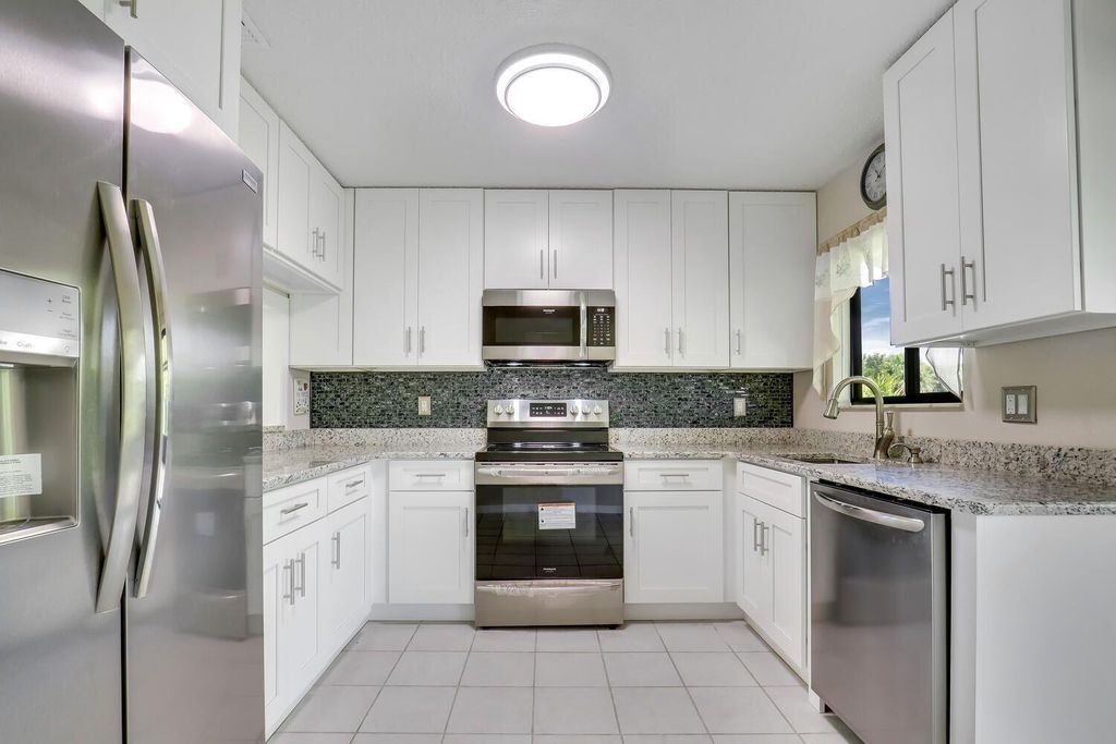 Photo of 791 SW Claudia Avenue SW, Port St Lucie, FL 34953 (MLS # R10855630)