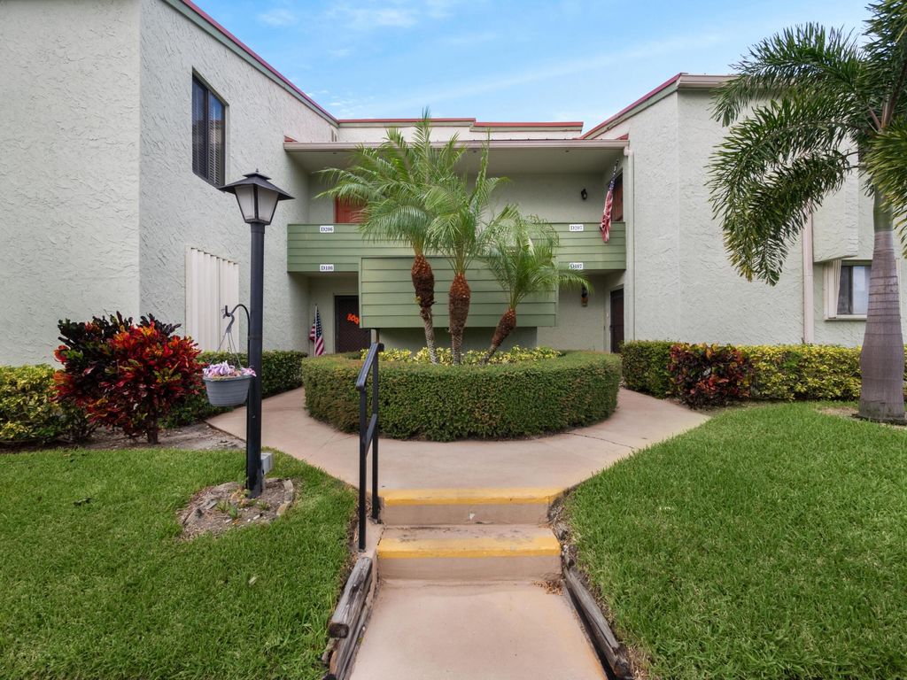 Photo of 5443 SE Miles Grant Road #206, Stuart, FL 34997 (MLS # R10933319)