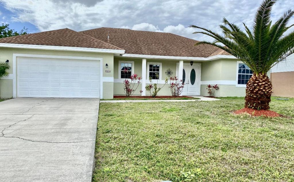 Photo of 4012 SW Alice Street, Port Saint Lucie, FL 34953 (MLS # R10946527)