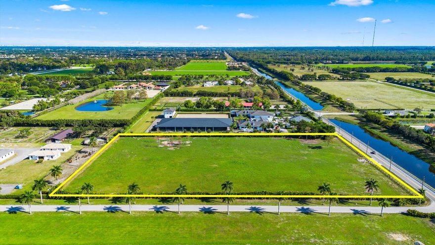 Discover an unparalleled opportunity to own 5.2 acres of raw, build-ready land in the heart of Wellington, perfectly positioned just minutes from the world-renowned Winter Equestrian Festival and Global Dressage Festival. This rare offering combines privacy, prestige, and unbeatable accessibility to the epicenter of Wellington's equestrian lifestyle.