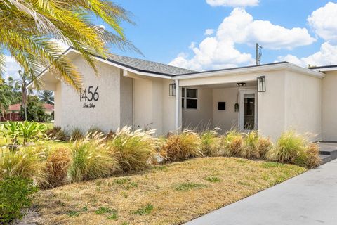 Photo of 1456 Cross Way, West Palm Beach, FL 33401 (MLS # B26011170)