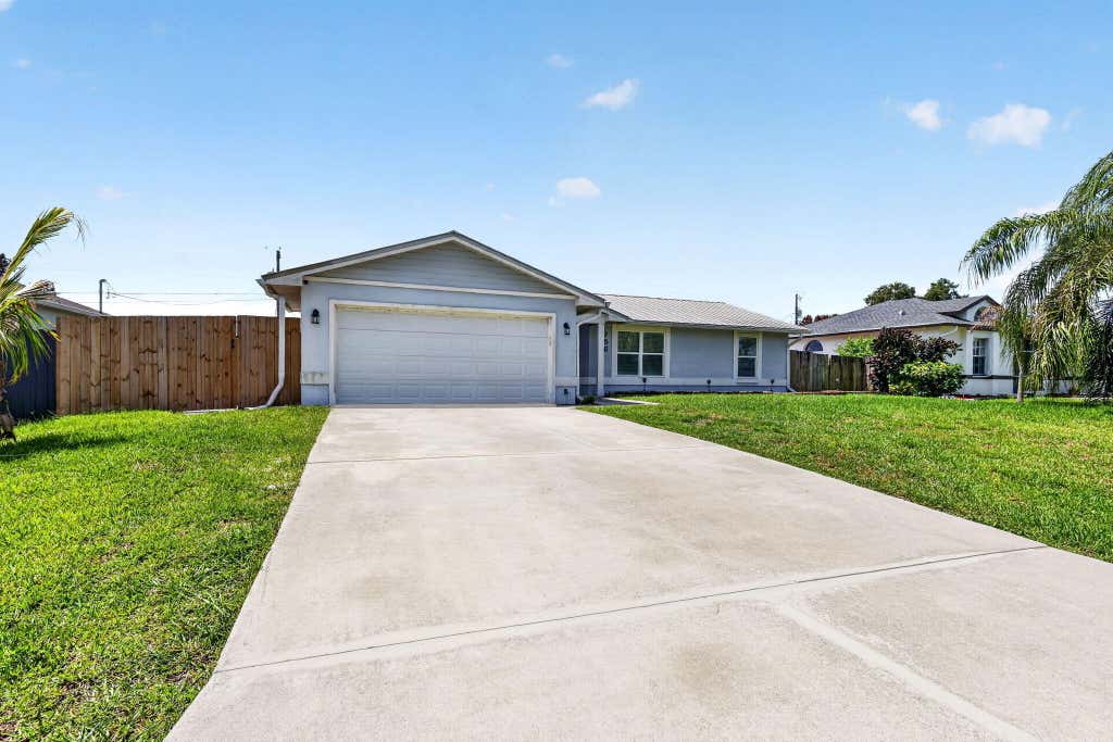 Photo of 756 SW Ancona Road, Port Saint Lucie, FL 34953 (MLS # B26058116)
