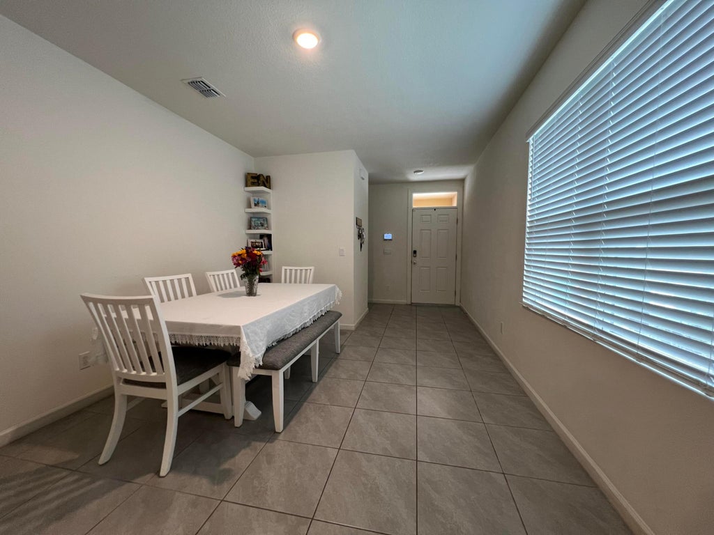 Photo of 12326 SW RIMINI Way, Port Saint Lucie, FL 34987 (MLS # B26074512)