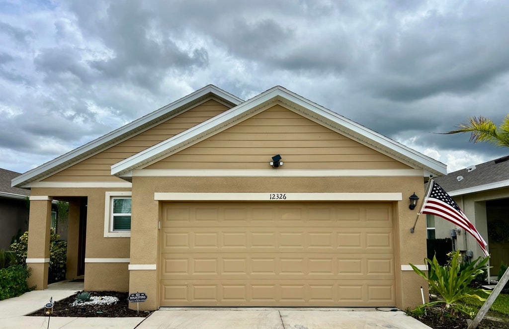 Photo of 12326 SW RIMINI Way, Port Saint Lucie, FL 34987 (MLS # B26074512)