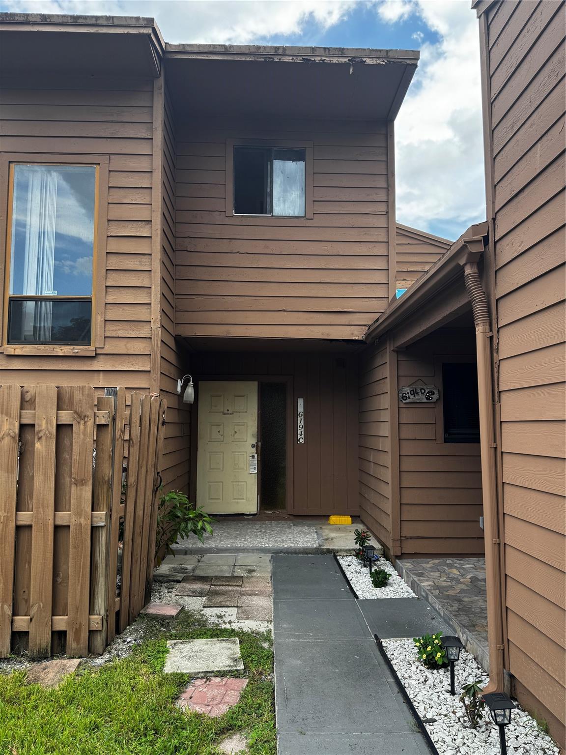 Investor Opportunity – Distressed Property Spacious 3 bedroom, 2.5 bathroom townhouse in Tamarac with over 2,300 sq. ft. of living space and high ceilings. Property sustained a fire in the upstairs area and repairs have been halted pending permits. Being sold as-is and available to cash buyers only. After Repair Value (ARV) is estimated at $330,000–$350,000, offering strong potential for investors seeking a flip or long-term rental. Buyers are encouraged to verify all issues with the City of Tamarac and the HOA prior to submitting offers. Centrally located near major highways, shopping, and schools. HOA community with amenities. Priced to reflect condition and work required. HOA. No approval for buyer, approval needed for renter.