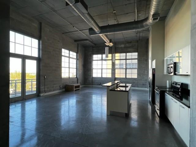BEAUTIFUL CORNER 2/2 LOFT STYLE CONDO LOCATED ON THE TOP FLOOR WITH HIGH CEILINGS. THE OPEN KITCHEN OFFERS GRANITE COUNTER TOPS, TOP OF THE LINE APPLIANCES, AND AMAZING PANARAMIC VIEWS WITH GORGEOUS SUNSETS AND LARGE OPEN BALCONY. IMPACT DOORS AND WINDOWS. WALKING DISTANCE TO LAS OLAS AND TO SOME OF THE BEST ENTERTAINMENT AND FINE DINING.